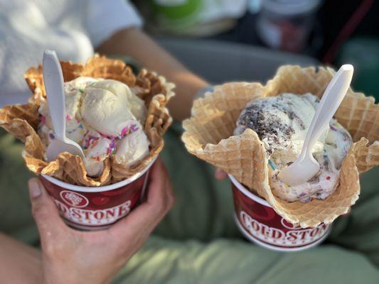 Kids size single scoop ice cream in waffle bowls with one free topping (sprinkles on both in photo)