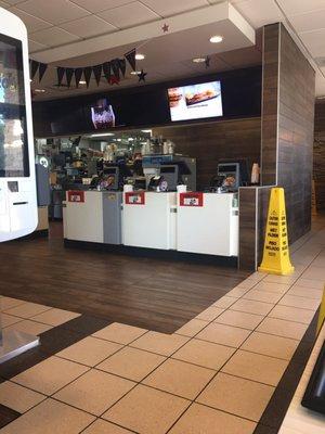 Front counter. The employee taking your order is very friendly and constantly cleaning when not taking orders