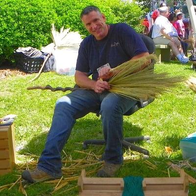 Mark Hendry resident artist / owner of Organic Artist Tree demonstrating traditional Shaker style broom making. oatree.com