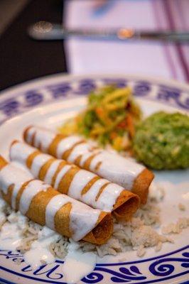 Flautas: Chicken or Potato (we got potato), corn tortillas, broccoli mango slaw, rice, guacamole, and roasted poblano cream.