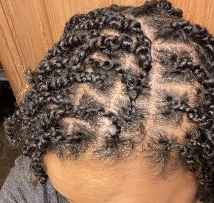 Two-strand twist starter locs from Lys African Braiding