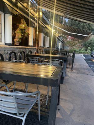 Outdoor seating with heaters and awning covers