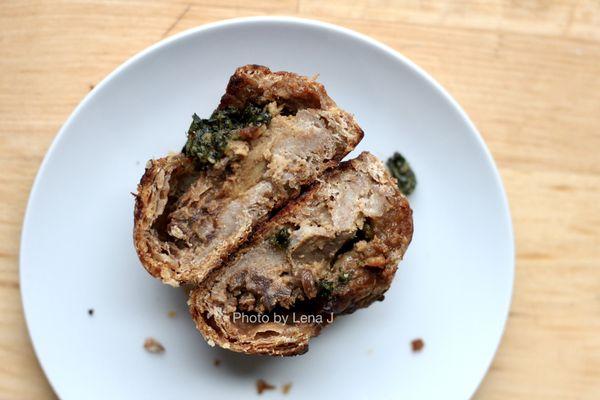 Inside of Smoked Malt Potato Knish ($3.50) - potato and caramelized onion filling, walnut and basil pesto on top