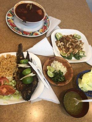 Mojarra frita, seafood soup, and shrimp.