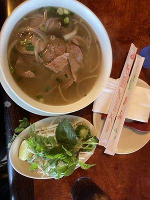 Rare beef Pho, broth was REALLY hot and delicious.