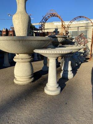 Cement birdbaths of all sizes.