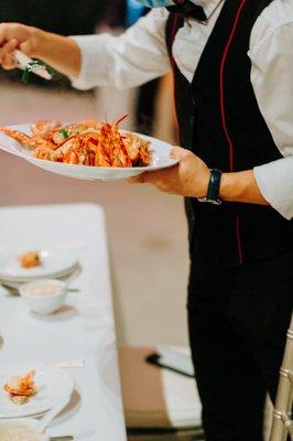 Lobsters with ginger scallion being served