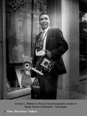 Ernest C. Withers standing in front of his photography studio on the historical Beale Street