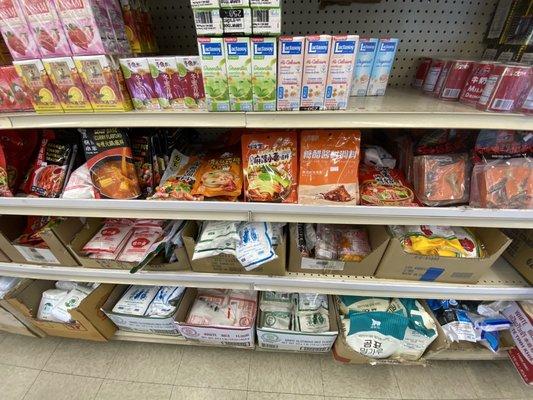 different types of flour, hot pot broth, and juice boxes