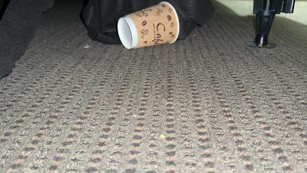 Cups under the bed.