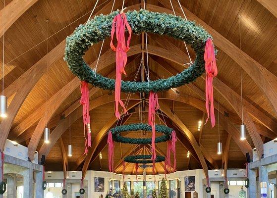 For me, the three Christmas wreaths hanging in Saint Rita's Catholic Church symbolize The Holy Trinity.