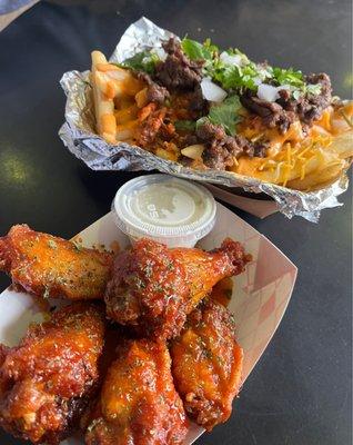 Hot bokki wings and kimchi fries