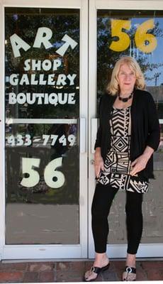 Owner, Karin Zimmerman, of Atelier Alcaniz standing in the Entrance to the shop.