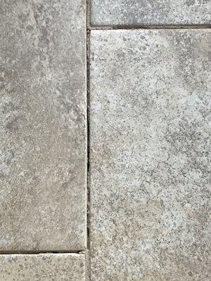 Crumbling Grout days after second time around.