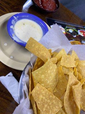 Chips salsa and cheese dip