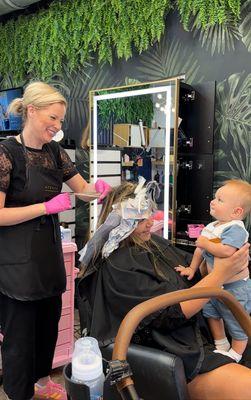 Happy momma getting her highlights done by Liz!