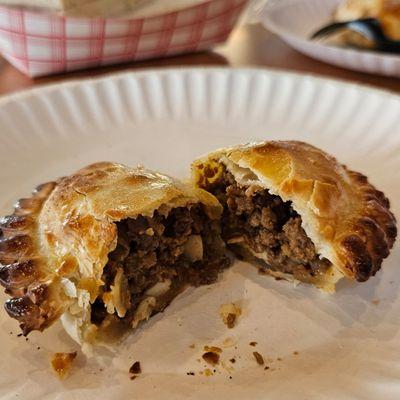 Sweet beef empanada.  Delicious.  Very well down.