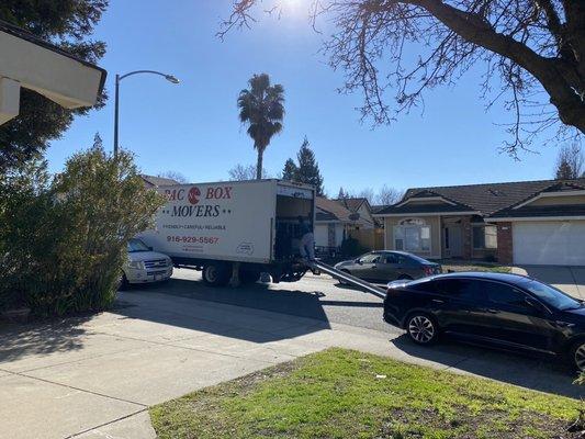 Moving truck with lift gate and ramp