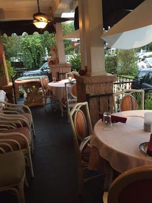 Cute outdoor seating area on the front porch