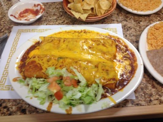 2 ground beef enchiladas (home made flour tortillas)