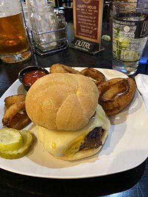 Ultimate cheeseburger with onion ring upgrade