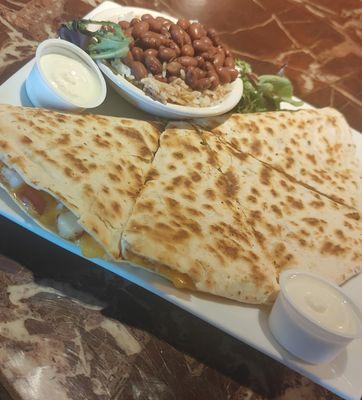 Shrimp Quesadilla with Peppers and Onions and side of Rice and Beans