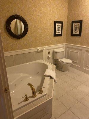 Bathroom with jacuzzi and shower