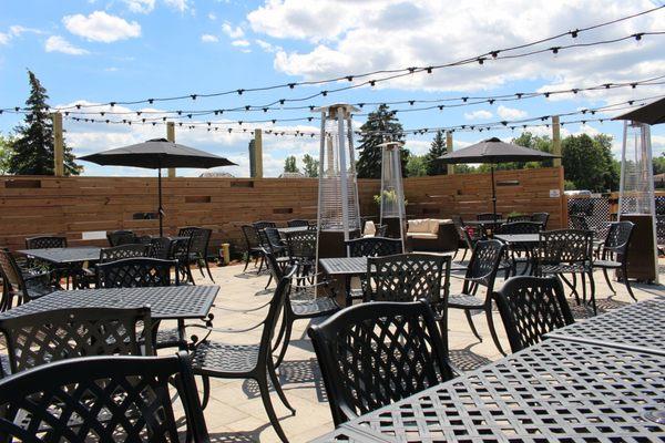 Brand new patio with heaters, lights, and TVs.