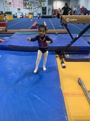 2 year old is having fun at the gymnastics