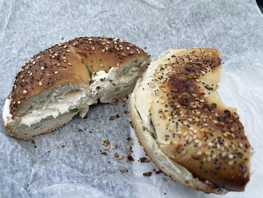 Scallion cream cheese on an everything bagel