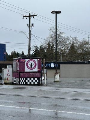 Bikini stand in the parking lot of the learning center. Wow. Just wow.