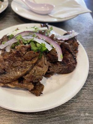 Ribeye for the ribeye pho - comes on the side. Delicious.