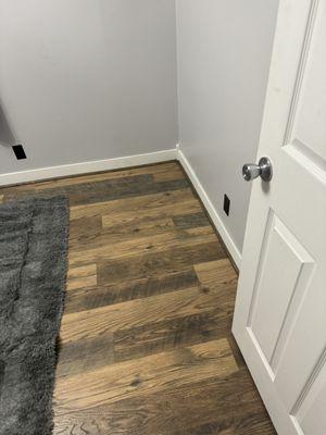 New floor and quarter round in Master bedroom.