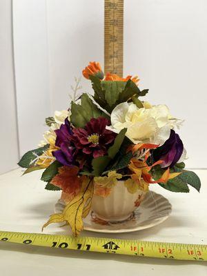 Adorable little tea cup arrangement is great for a small gift to a nursing home, hospital, or hostess.  $25.00