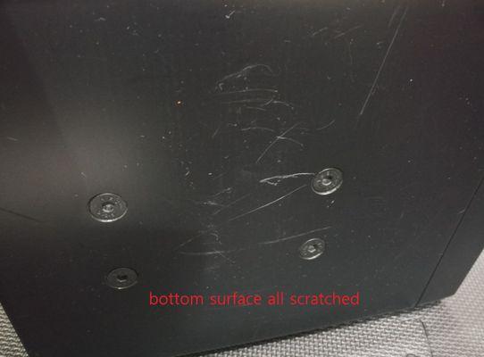 Scratched bottom surface. Probably from dragging it on hard surface with sharp objects.