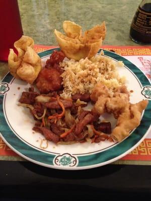 Crab Rangoon, sweet and sour pork, fried rice and the Gracie's special pork chop!!