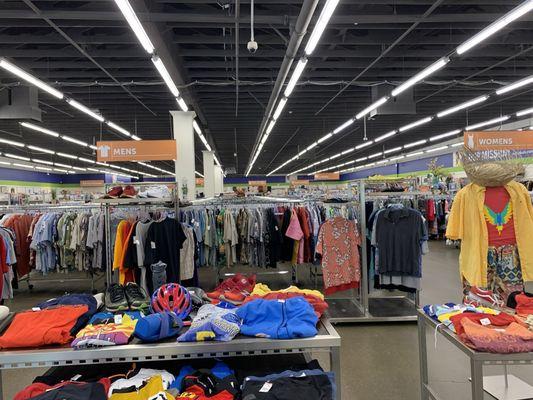 Part of the summery displays at the front of the store, with men's clothing section behind.