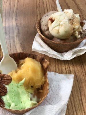 Pistachio and Mango in waffle bowl; Mocha, Caramel, and Kit Kat in waffle bowl