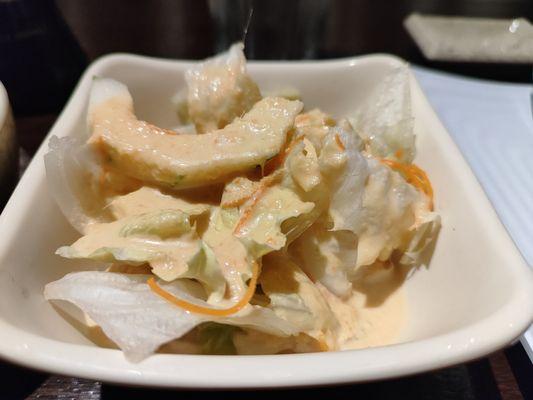 Standard side salad with iceberg, cucumbers, carrots, and ginger dressing.  Comes with combo dinners.