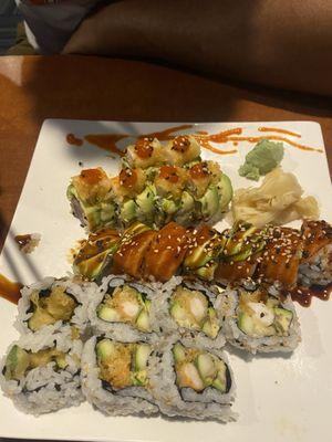 From top to bottom- possible firecracker? Smokey salmon, new Bern roll. Highly recommend the Smokey roll but all were good.