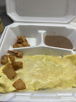 Veggie Omelet, with potatoes and beans...the portion of potatoes and beans were extremely small,  For the price, it should be more!