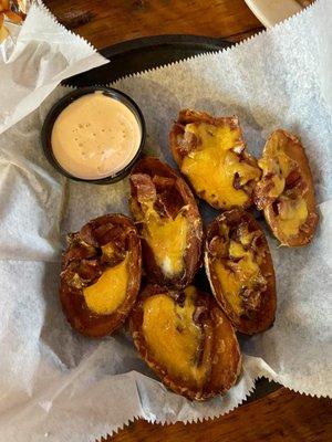 Potato skins with spicy dipping sauce