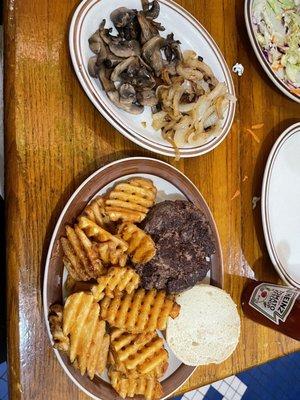 Burger. Waffle fries. Onions and shrooms