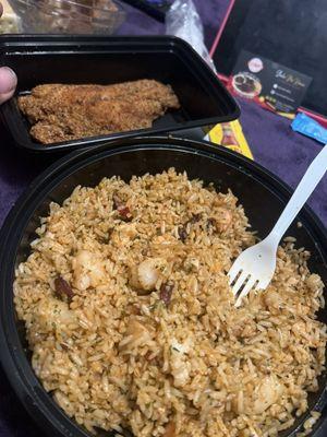 Shrimp, sausage and chicken jambalaya with a side of catfish fried hard