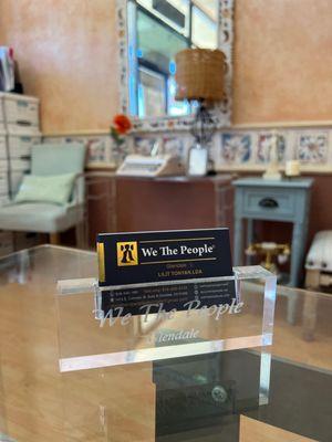 We The People business card.