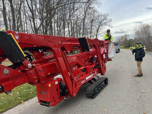 100ft CMC Spider lift, light on the yards, can get through a 36" gate, and can reach up to 100ft!! Great machine for hard to reach areas.