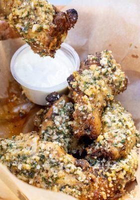 Roasted Buffalo Chicken Wings with house made garlic parmesan sauce