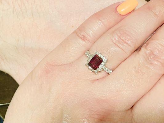 My husband bought this gorgeous one of a kind emerald shaped garnet as my engagement ring and I love it!