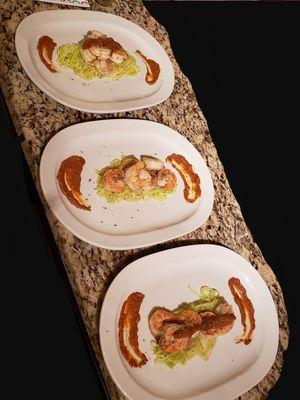 Garlic shrimp with a romesco sauce and sauteed zoodles