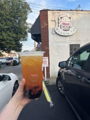 Peach green tea with tapioca pearls and strawberry popping boba